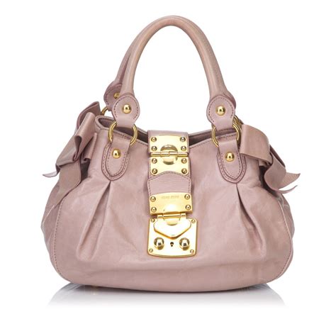 miu miu bow bag second hand|miu miou handbags for sale.